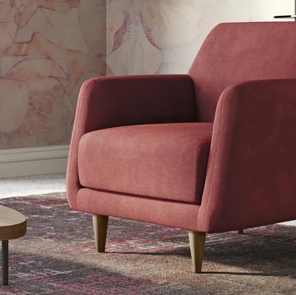 Poltroncina in tessuto con piedi in legno Adele di Doimo Salotti