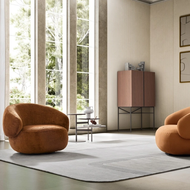Poltroncina in tessuto dalle linee curve Pacific di Ditre Italia