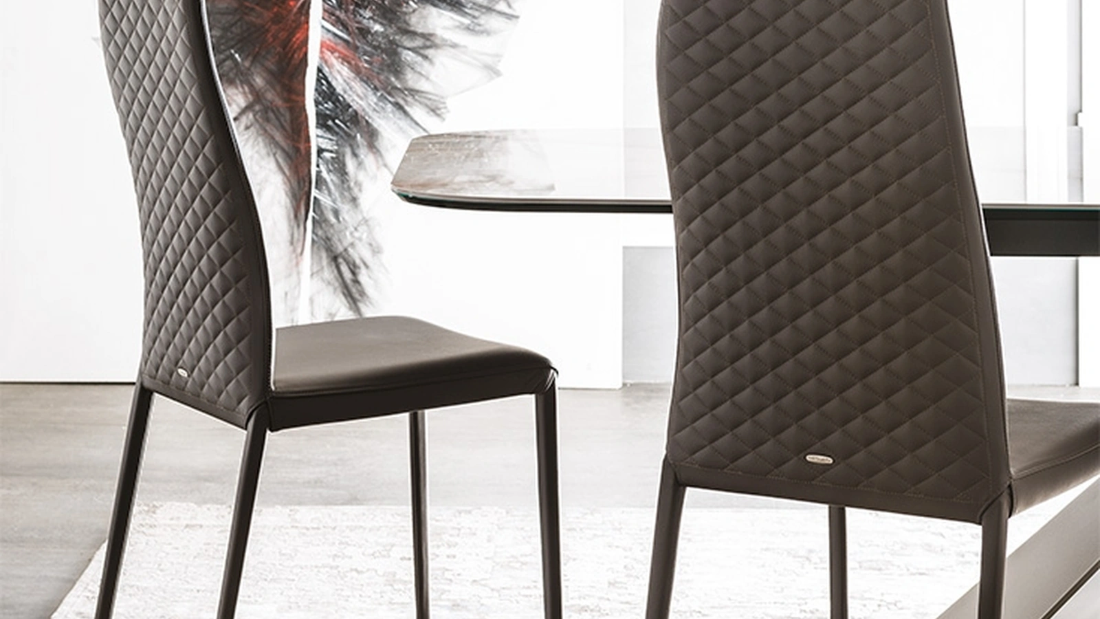 Sedia in pelle con schienale alto trapuntato Norma Couture di Cattelan Italia