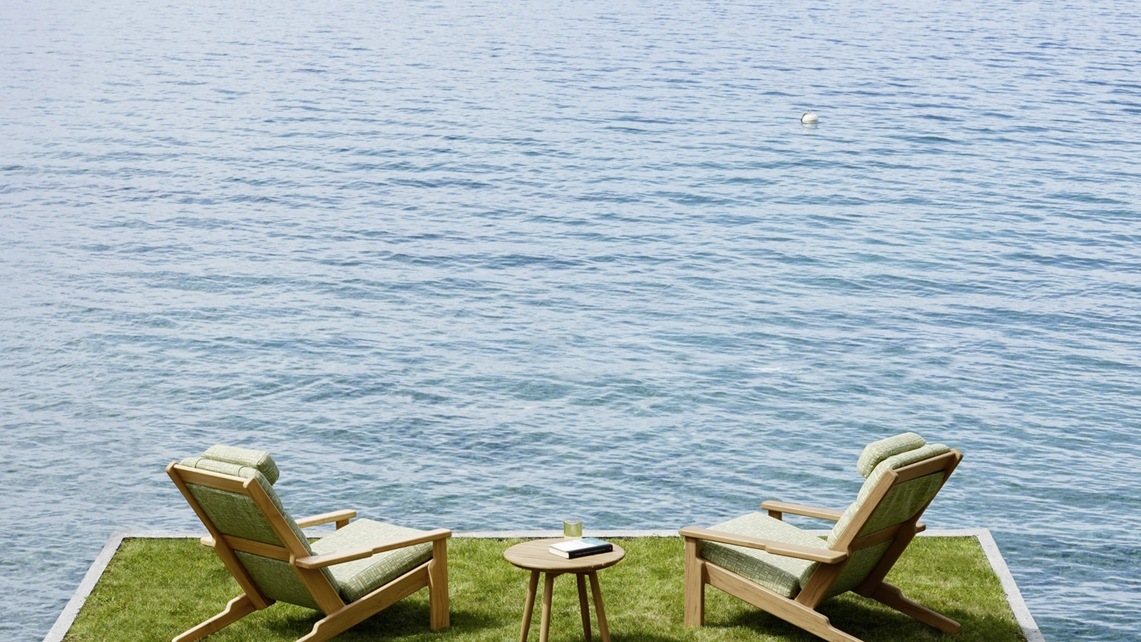 Poltrona Bali Bergère in massello di Teak e tessuto imbottito di Varaschin