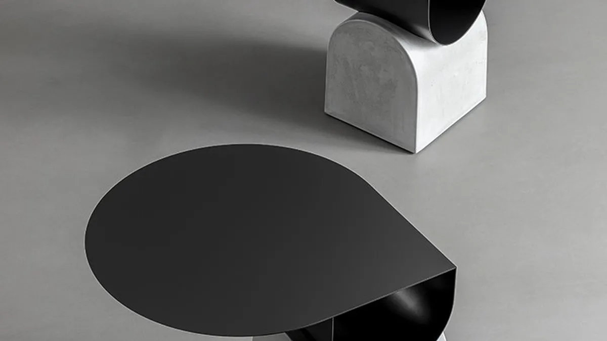 Tavolino Vague coffee table in metallo con base in cemento di Bonaldo