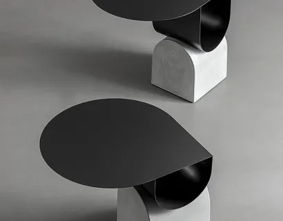 Tavolino Vague coffee table in metallo con base in cemento di Bonaldo