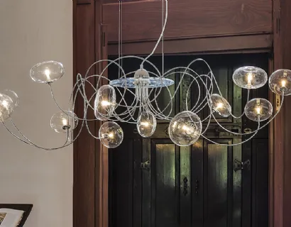 Lampada a sospensione con bracci in cromo e paralumi in cristallo Oktopus di Cattelan Italia