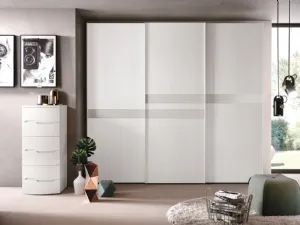 Armadio Opera materico Rovere Bianco ed inserti vetro decoro astro laccato di Corso 11