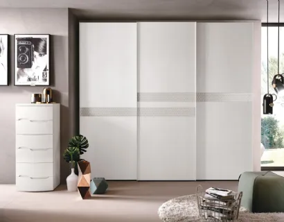 Armadio Opera materico Rovere Bianco ed inserti vetro decoro astro laccato di Corso 11