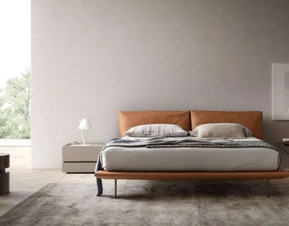 Letto Cali in pelle con testiera di Presotto