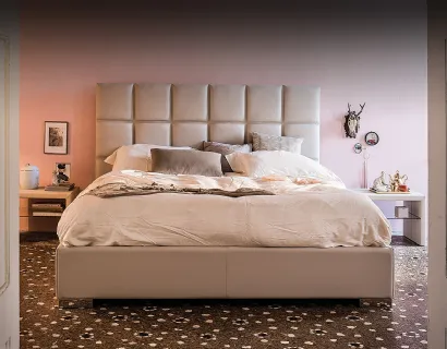 Letto contenitore con testiera in ecopelle trapuntata William di Cattelan Italia