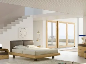 Letto in legno massello con testiera imbottita rivestita in pelle Ricordo di Fazzini