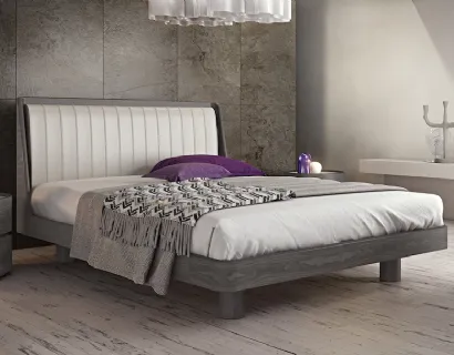 Letto in legno con testiera imbottita in pelle Incanto di Fazzini