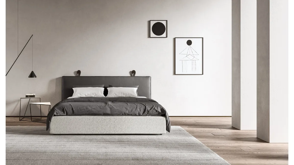 Letto con testiera in pelle e giroletto in tessuto Delfi di Presotto