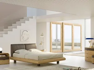 Letto in legno massello con testiera imbottita rivestita in pelle Ricordo di Fazzini