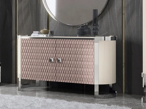 Madia Kursaal in laccato lucido e tessuto trapuntato di Adriatica