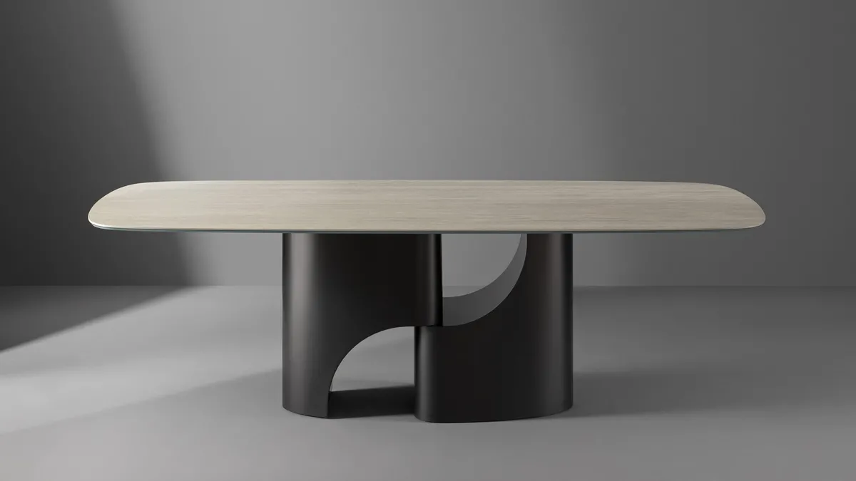 Tavolo Taijitu con piano in marmo e base in metallo di Bonaldo