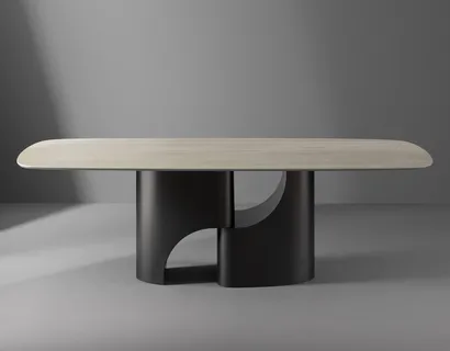 Tavolo Taijitu con piano in marmo e base in metallo di Bonaldo