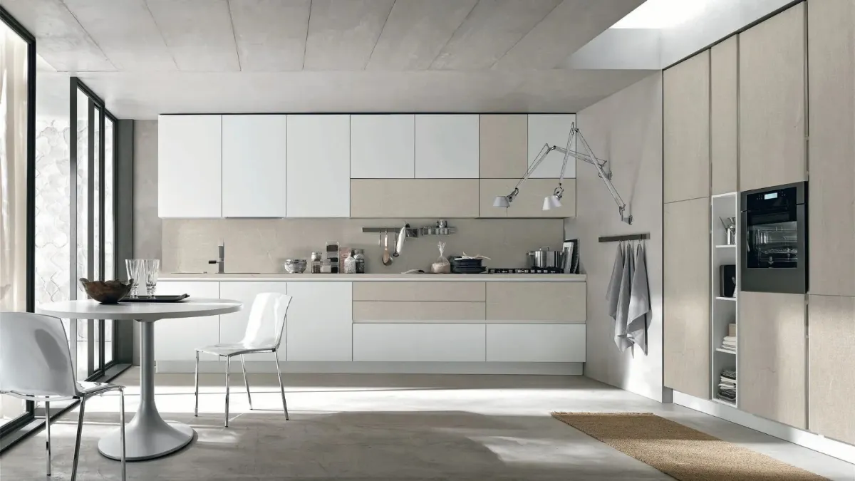 Cucina Moderna ad angolo Alevé v13 in laccato UV Neve opaco e laminato materico Pietra Piasentina di Stosa