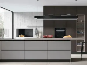 Cucina Moderna con penisola Infinity v07 in materico Cemento e Fenix Grigio con top in Graniglia di Stosa